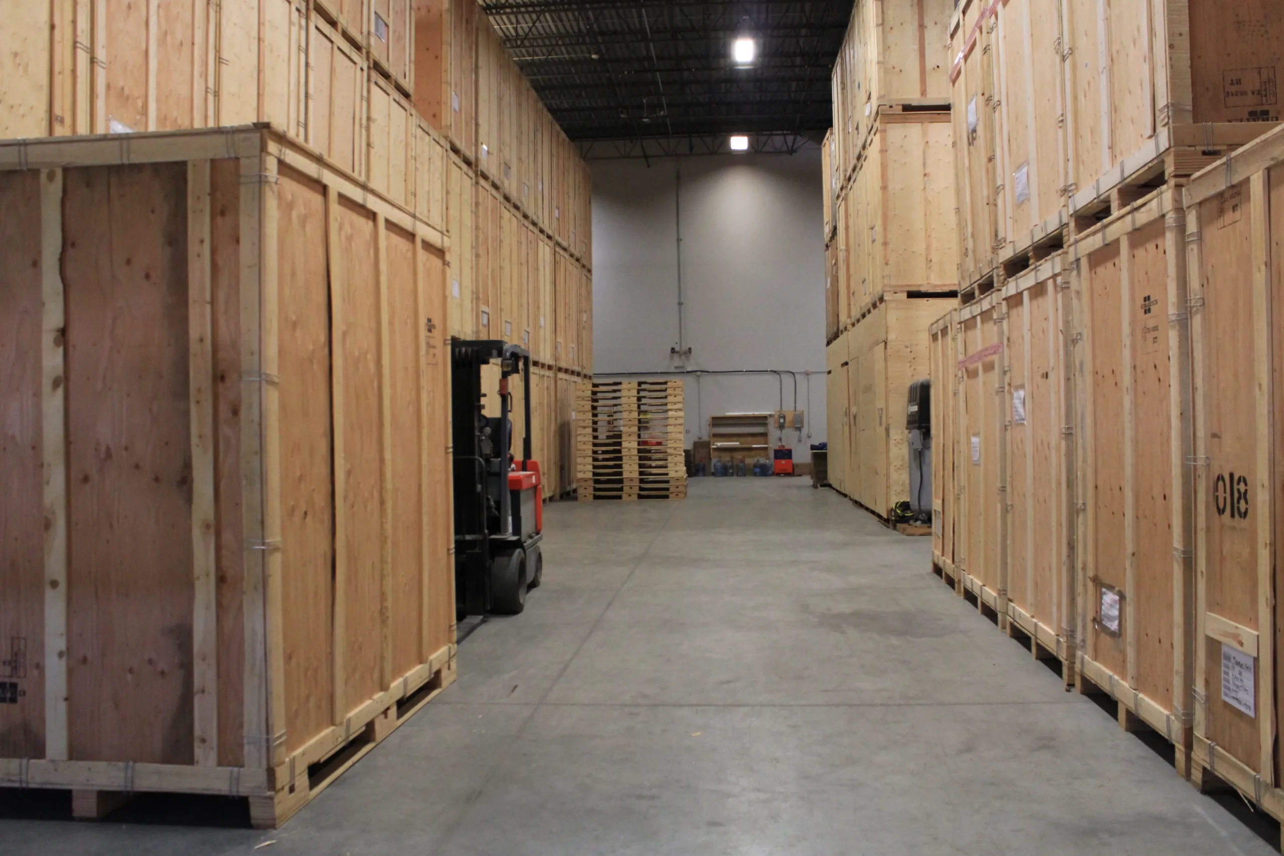 Secure storage facility in Calgary with wooden crates for short- and long-term storage